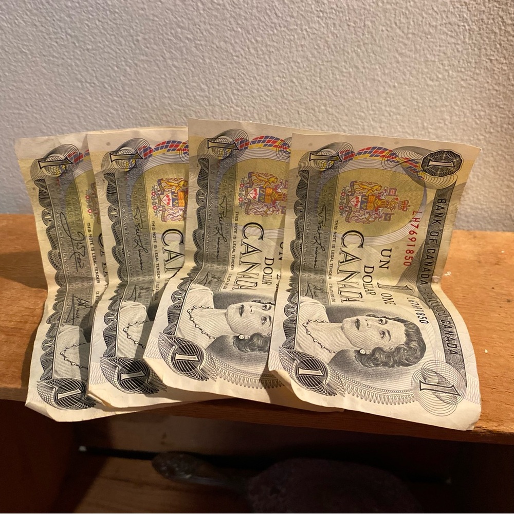 Four 1973 Canadian One Dollar Bills